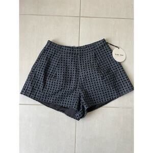 Line + Dot Multicolor High Waist Plaid Pleated Eyelet Shorts Lined
